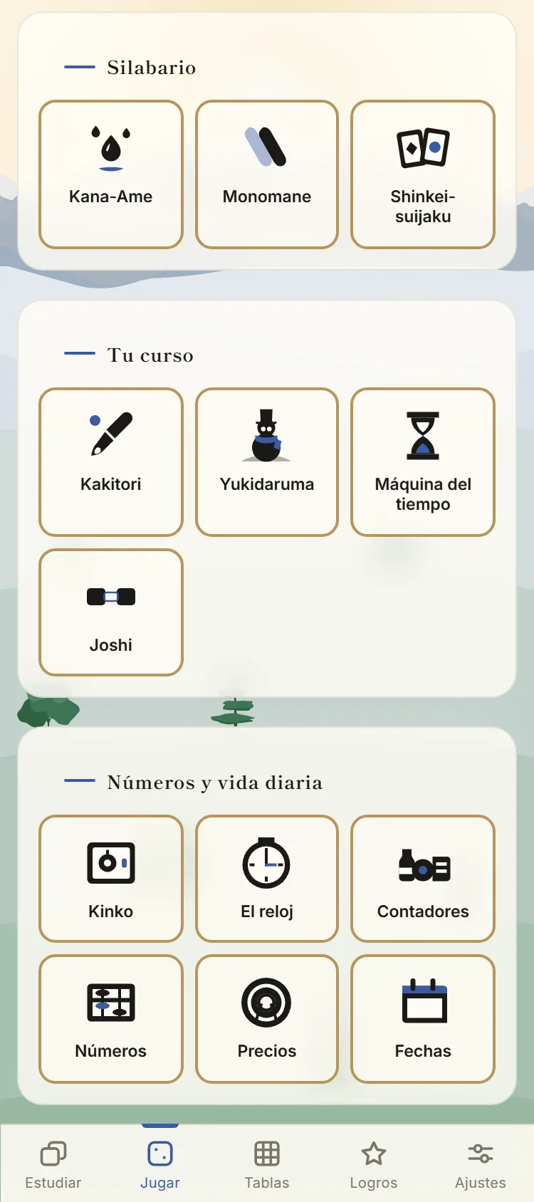 La pantalla de juegos de la app, con trece juegos agrupados: silabario, el curso y números y vida diaria.